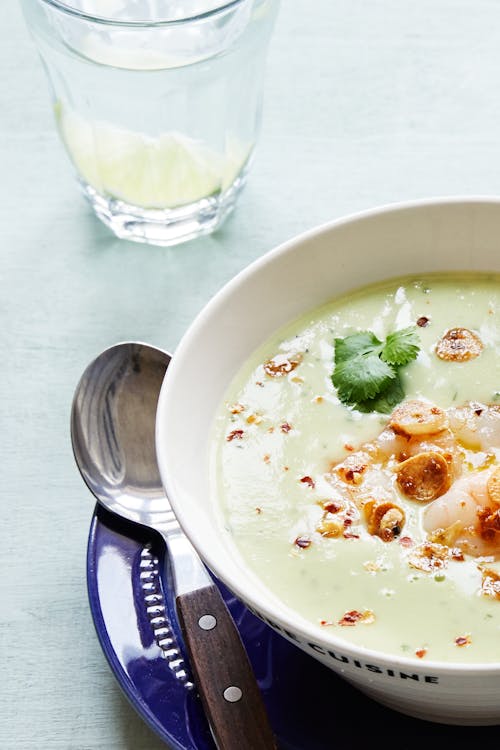 Avocado soup with shrimp and garlic chips