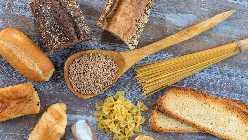 food with gluten base on white and whole floor,on grey slate background