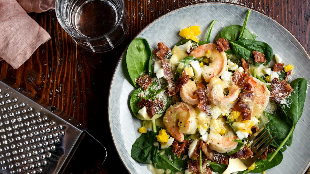 Shrimp salad with hot bacon fat dressing