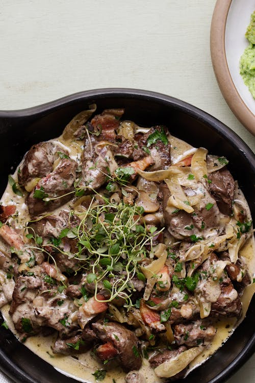 Chicken liver in mushroom sauce and broccoli mash