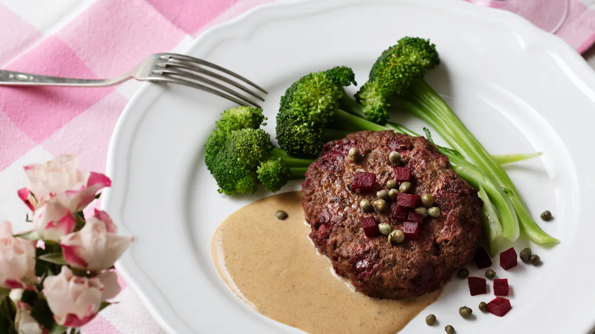 Beef burgers with beets, cream sauce and broccoli