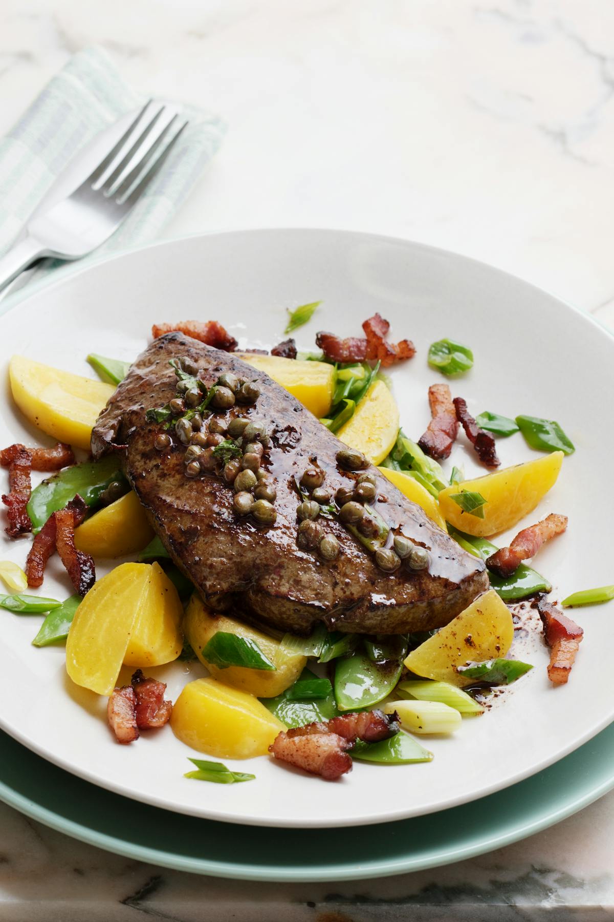 Veal liver with bacon and butter-fried veggies