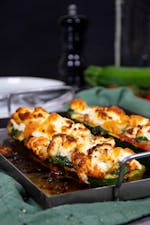 Keto zucchini pizza boats with goat cheese