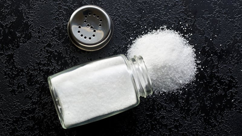 salt shaker on black kitchen table