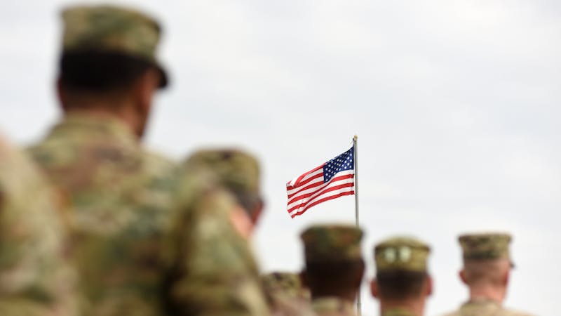 American Soldiers and US Flag. US troops