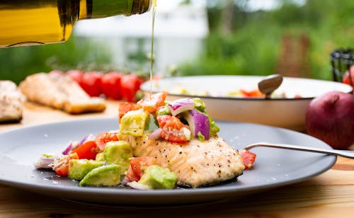 Grilled salmon with avocado topping
