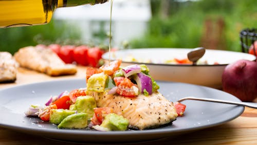 Grilled salmon with avocado topping