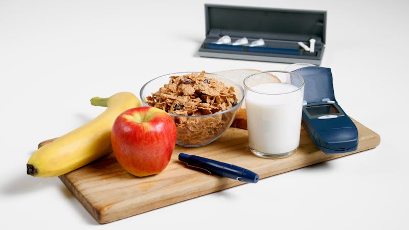 Healthy diabetic breakfast with testing and delivery devices