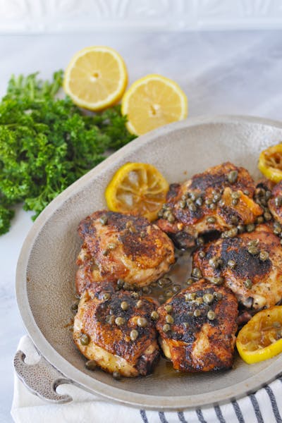 Crispy keto chicken thighs with lemon butter caper sauce