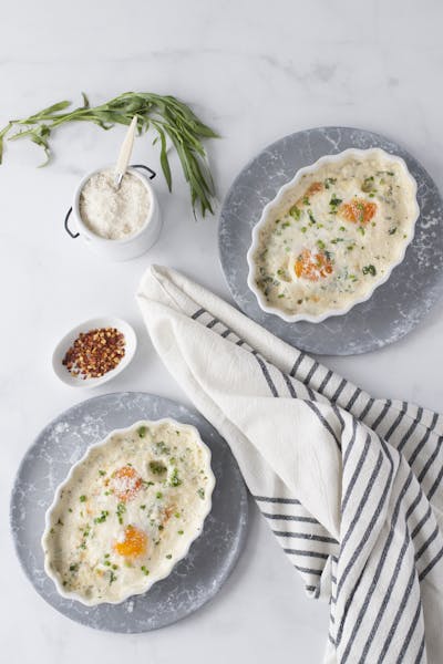 Keto baked eggs with tarragon chive cream sauce