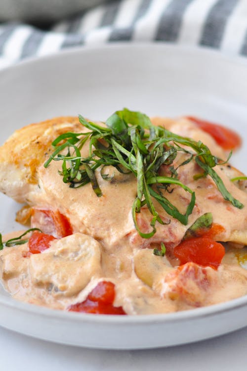 Keto chicken and mushrooms with tomato cream sauce