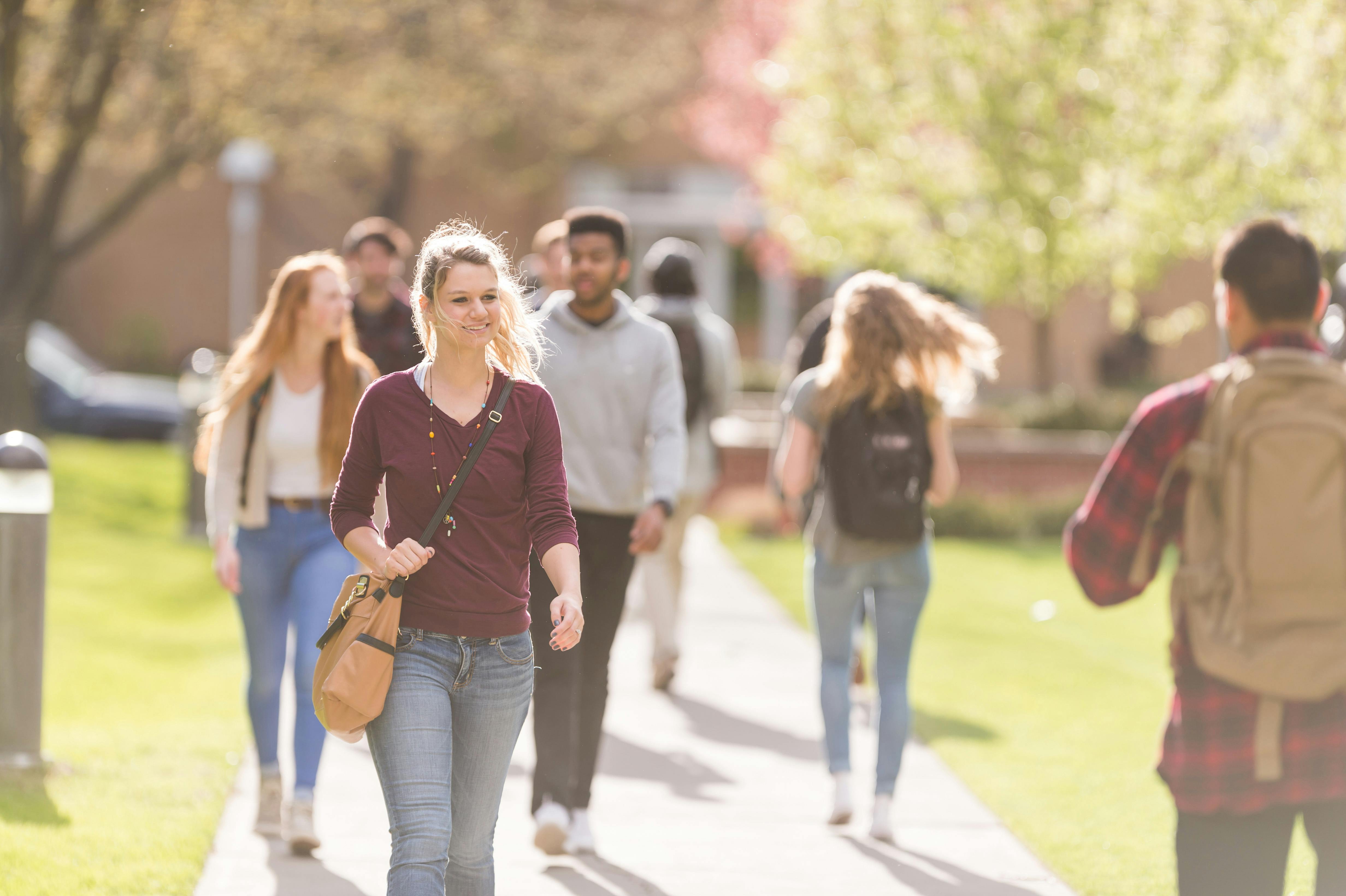 University life. College students Walking. Walking with book. Student Walking with book. Freshman student.