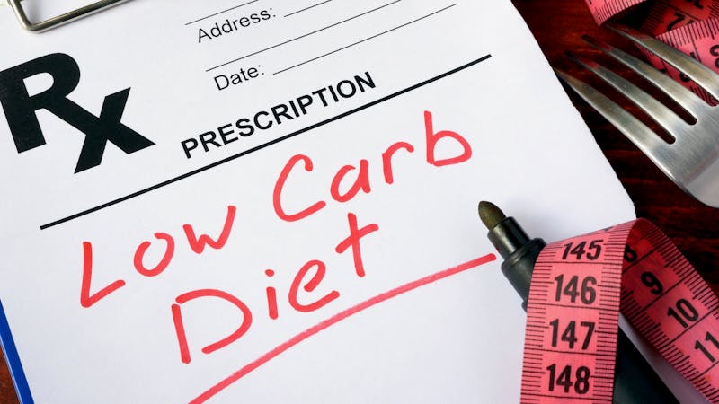 Prescription form with words low carb diet.