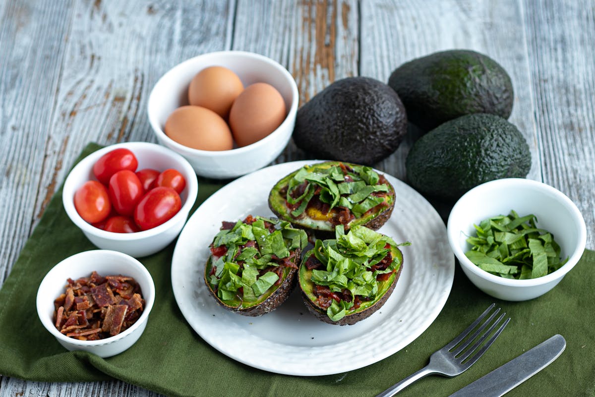 Keto BLT baked avocado eggs