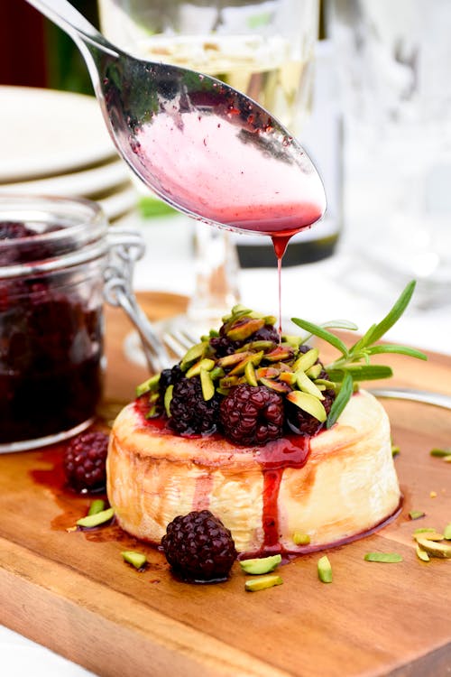 Keto baked goat cheese with blackberries and roasted pistachios