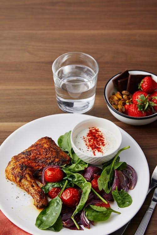 Roasted chicken legs with veggies, paprika sauce and dessert