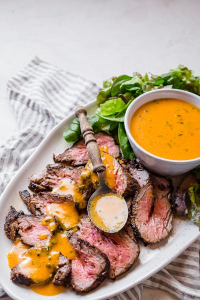 Pepper-crusted beef tenderloin with herbed steak sauce