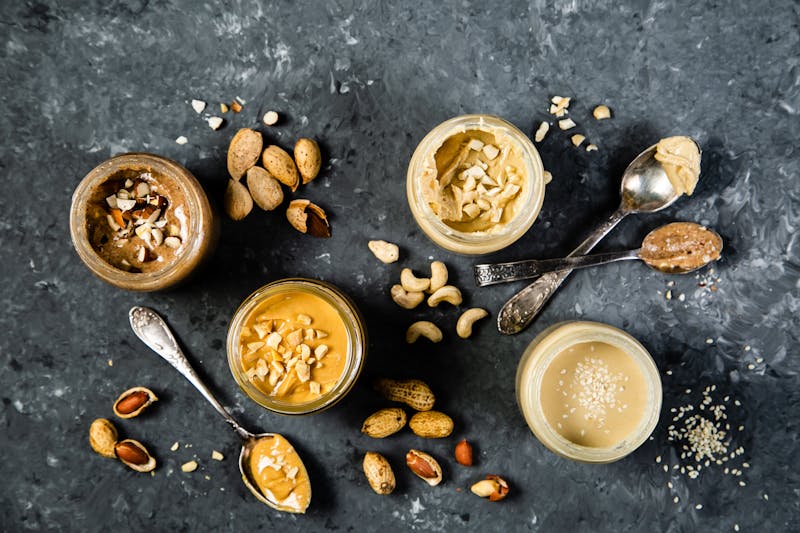 Selection of nut butters – peanut, cashew, almond and sesame seeds