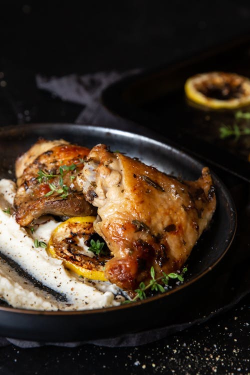 Lemon-baked chicken thighs with cauliflower mash