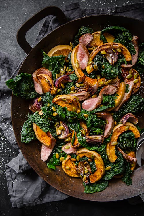 Roasted butternut squash and kale salad with lamb fillet