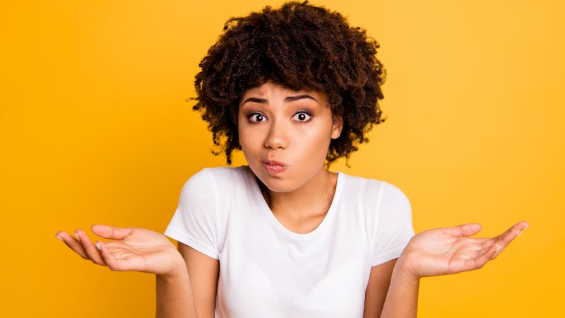 Close-up portrait of her she nice attractive puzzled ignorant wavy-haired girl showing gesture no information isolated on bright vivid shine yellow background