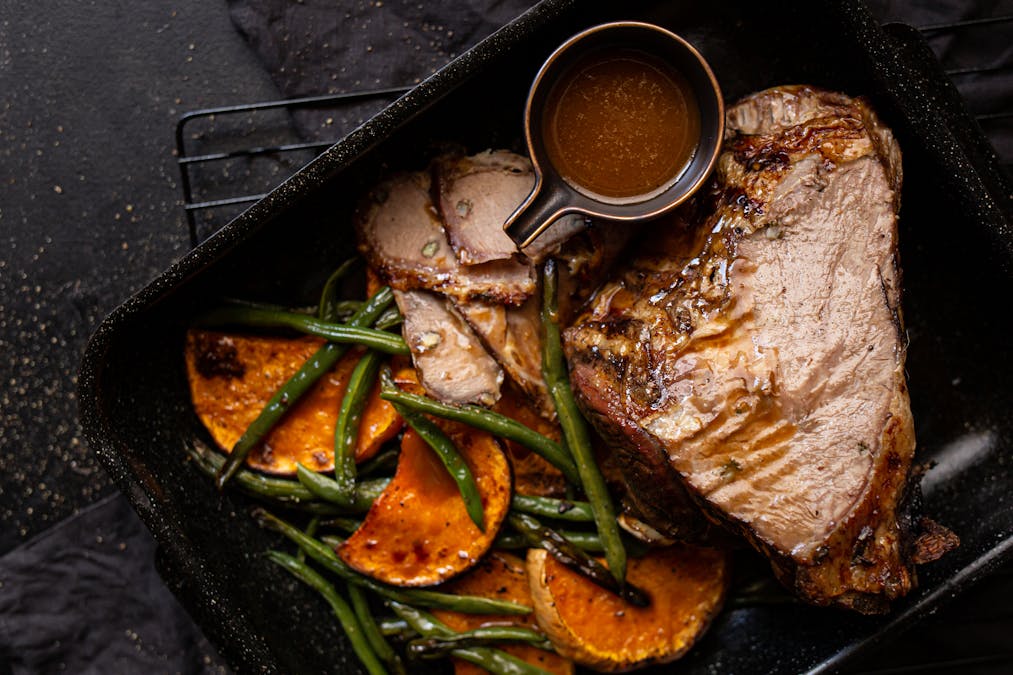 Sunday lamb roast with gravy and roasted vegetables