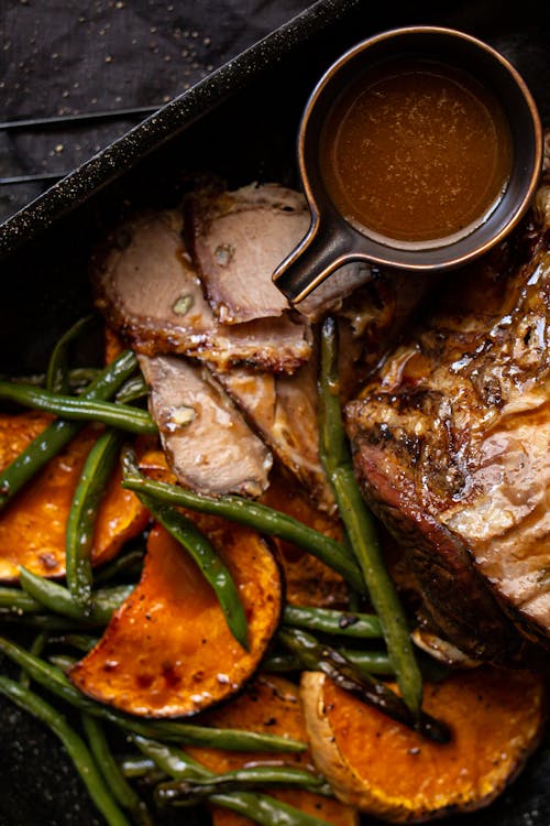 Sunday lamb roast with gravy and roasted vegetables