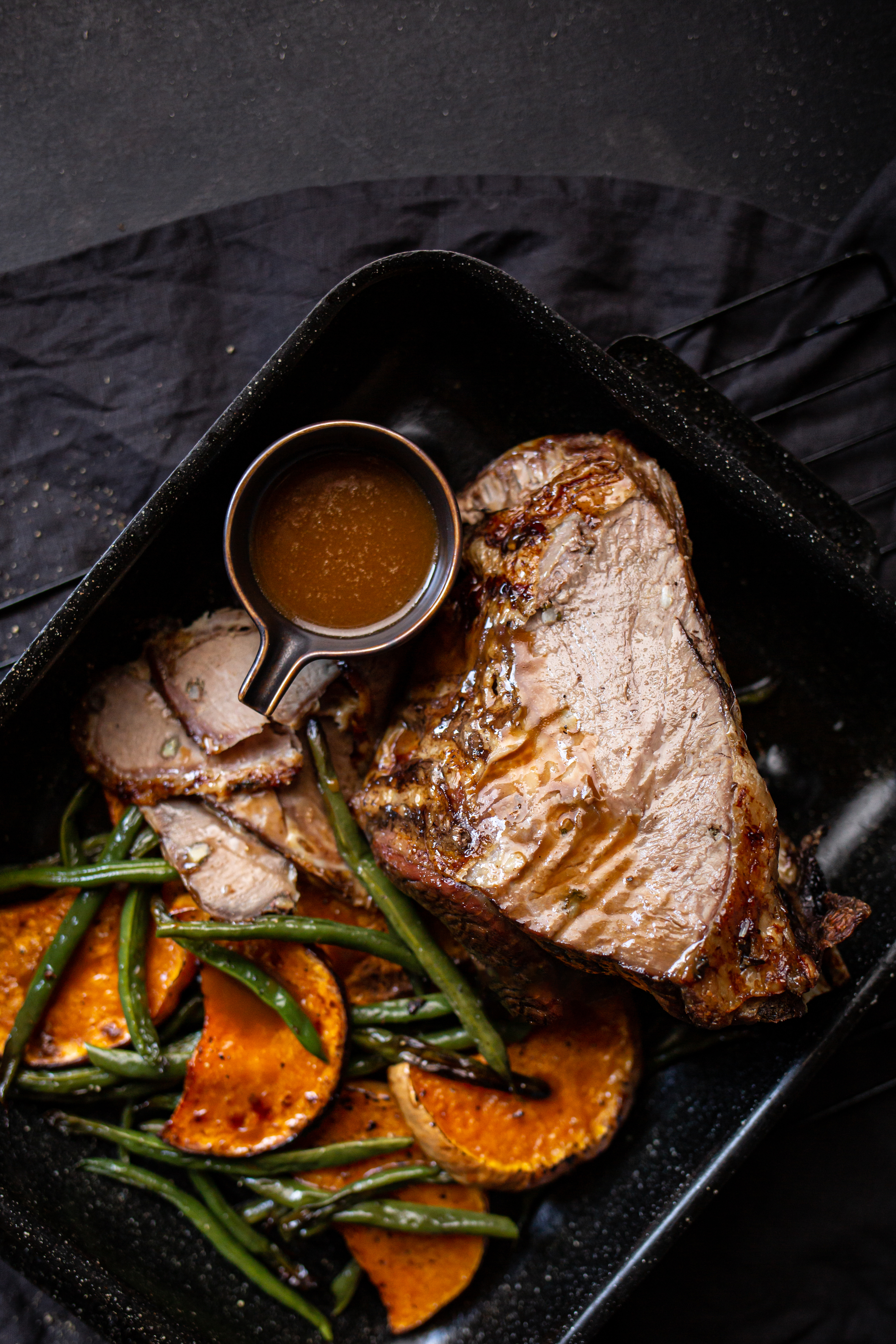 Sunday lamb roast with gravy and roasted vegetables