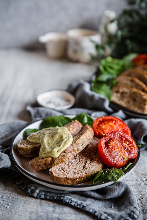 Keto Italian meatloaf with baked tomatoes and pesto mayo