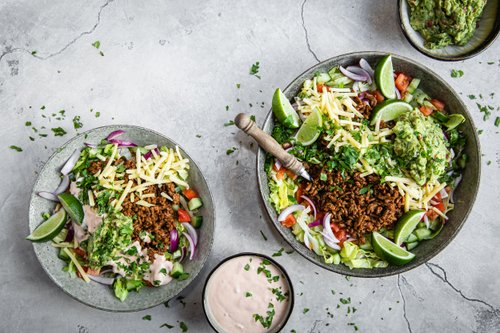 Keto taco salad with salsa dressing and guacamole