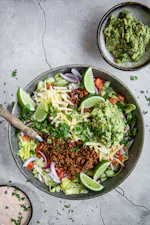 Keto taco salad with salsa dressing and guacamole