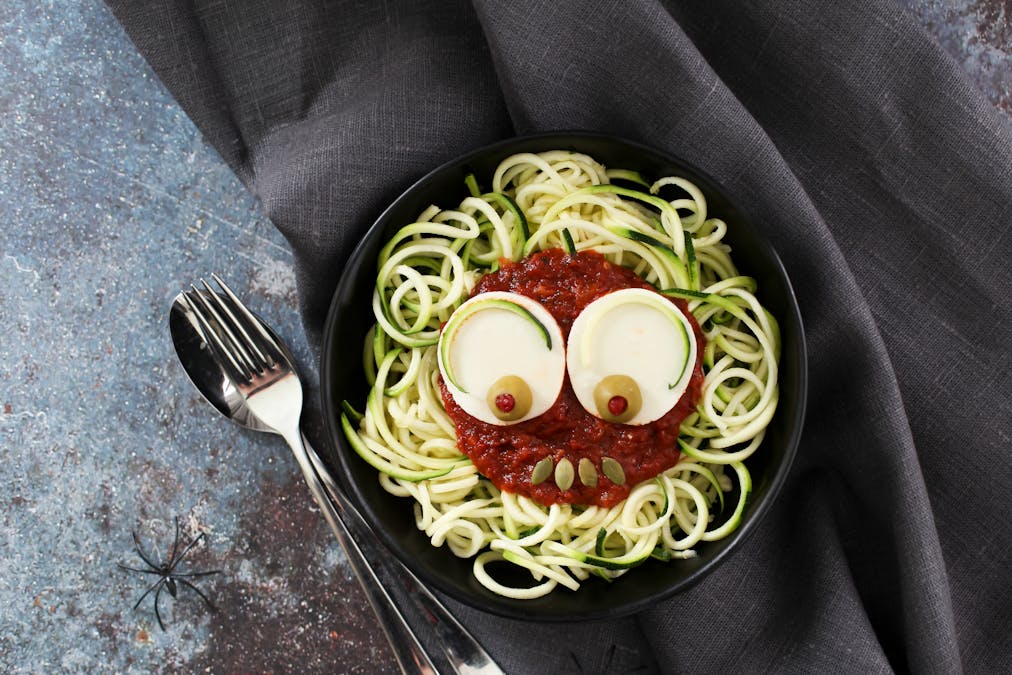 Spooky zoodles with tomato sauce and mozzarella