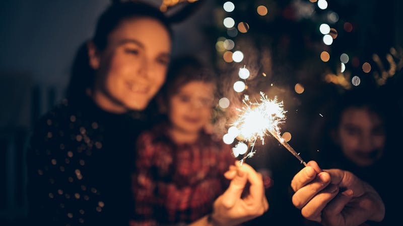 Mother and daughters enjoying Christmas