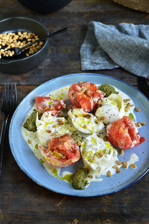 Burrata with tomato, cream and pesto