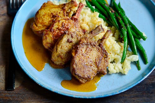 Lamb chops with creamy cauliflower and sauteed green beans
