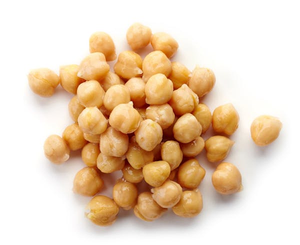 Heap of chickpeas isolated on white, from above