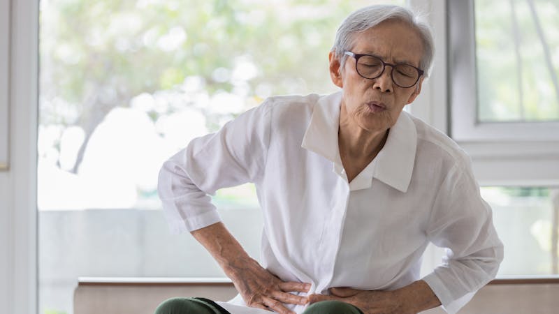 Sick senior patient with belly pain,severe stomach ache,symptoms gastrointestinal system disease,gut,digestion problems,diarrhoea,elderly woman suffer from stomachache,irritable bowel,food poisoning