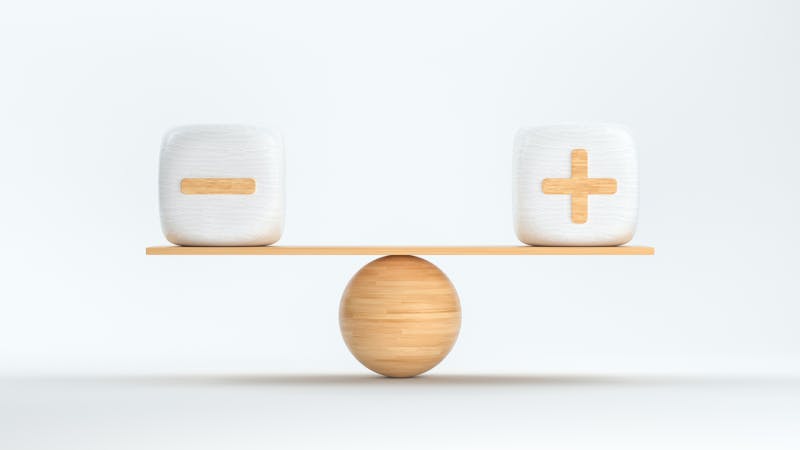 wooden scale balancing cubes with plus and minus symbols – 3D rendered illustration