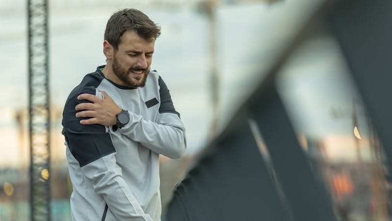 Handsome Young Sportsman Have Physical Injury of Shoulder During a Practice