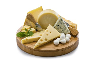 Cheeses board isolated on white background