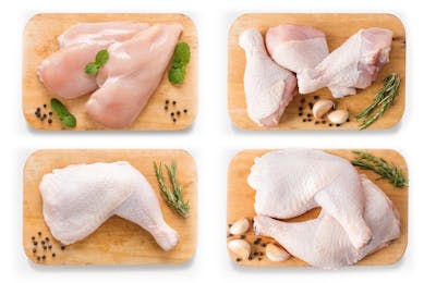 Mockup raw chicken and pork on cutting board set. isolated