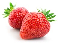 Two strawberries isolated on white background