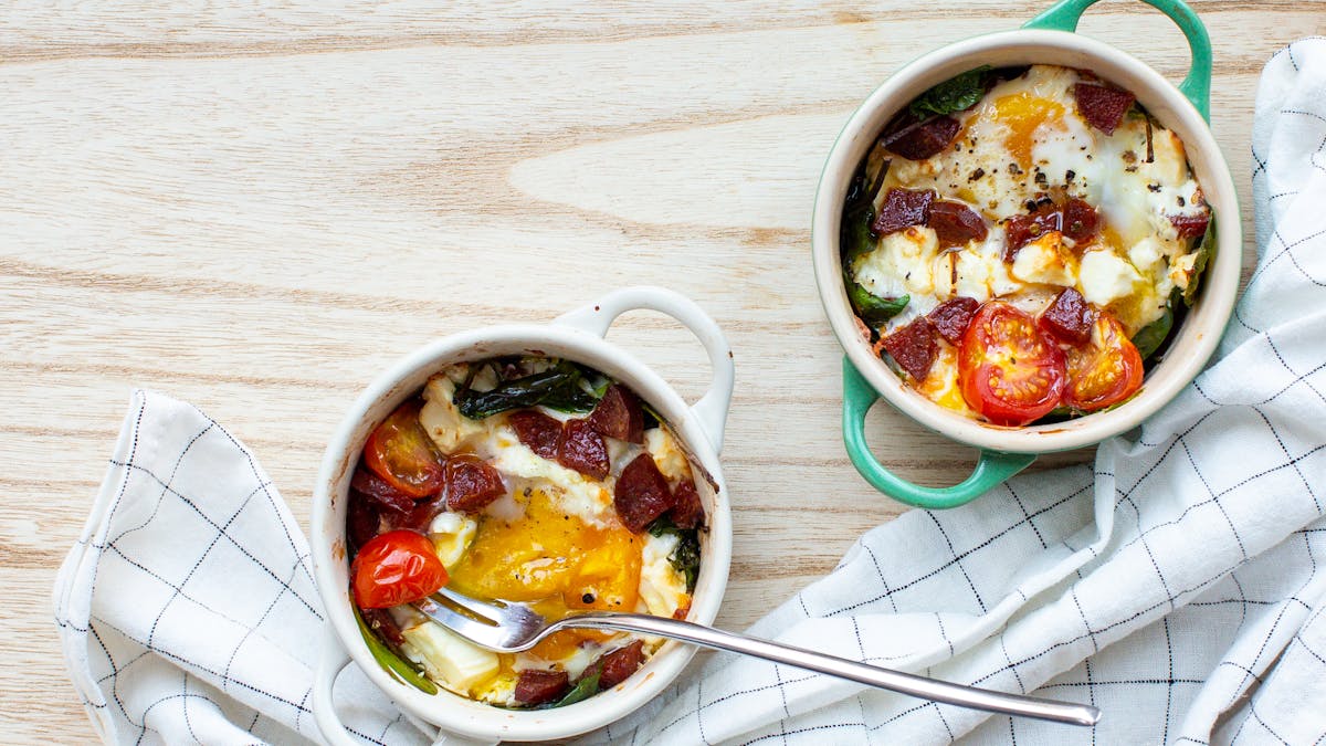 Baked egg pots with chorizo and feta cheese
