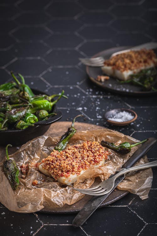 Chorizo crumb-topped cod with Padrón peppers