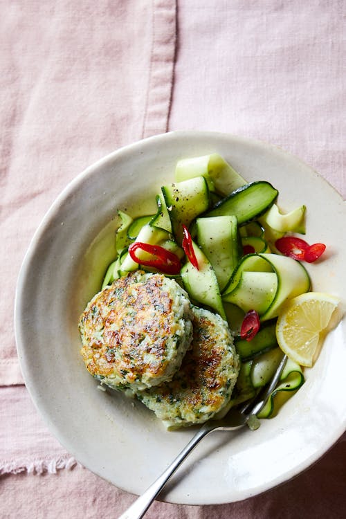 Herby fishcakes with zucchini salad