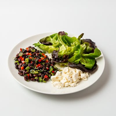 female-vegetarian-plate-with-edamame-and-feta-cheese