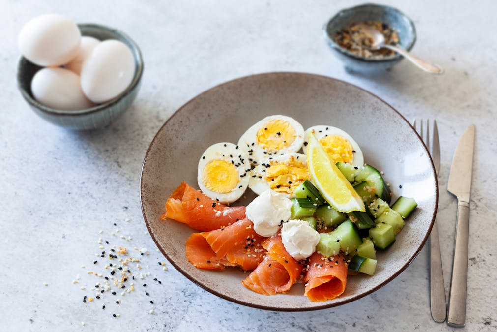High protein breakfast bowl with eggs and smoked salmon