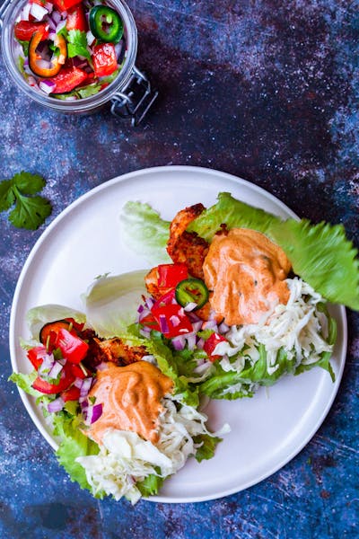 Blackened fish lettuce tacos with cajun remoulade