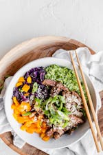 Keto beef and broccoli rice bowl with miso dressing