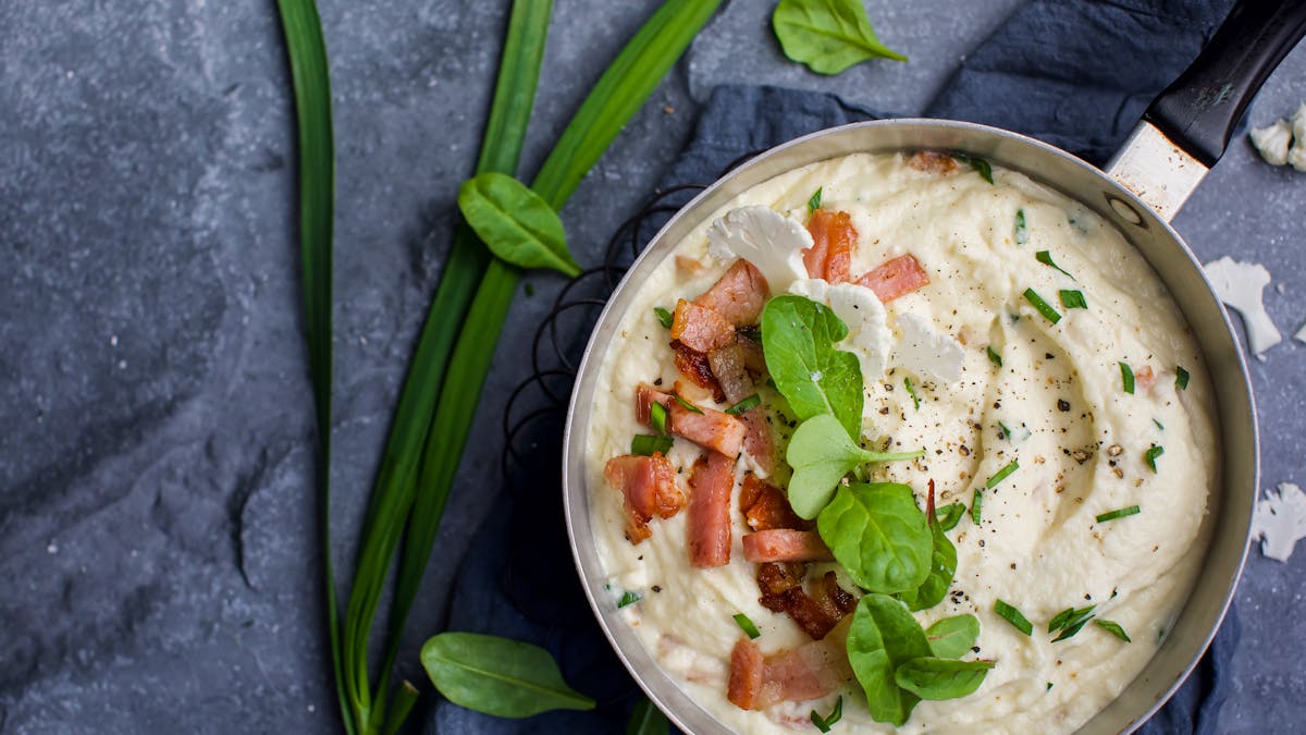 Keto cauliflower mash with pancetta and sour cream